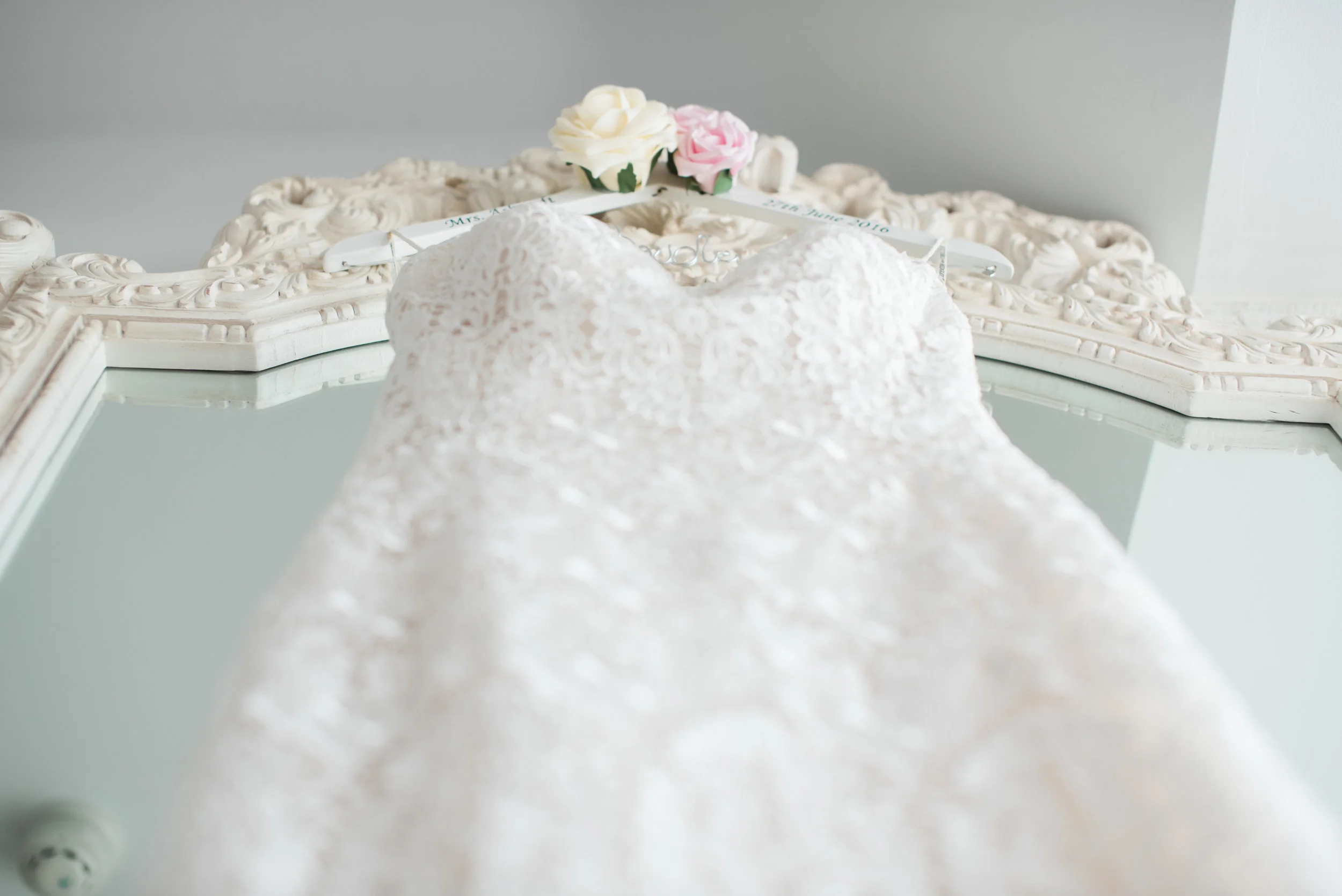 Detailed shot of the wedding dress. Lace wedding dress.