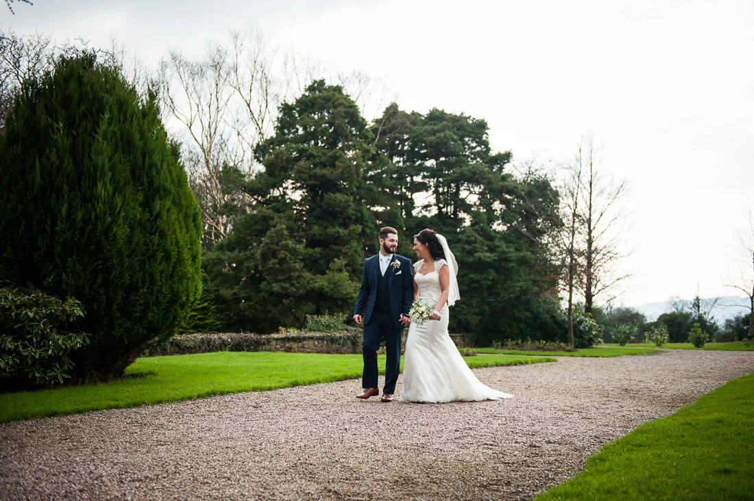 Natural shot of bride and groom walking together