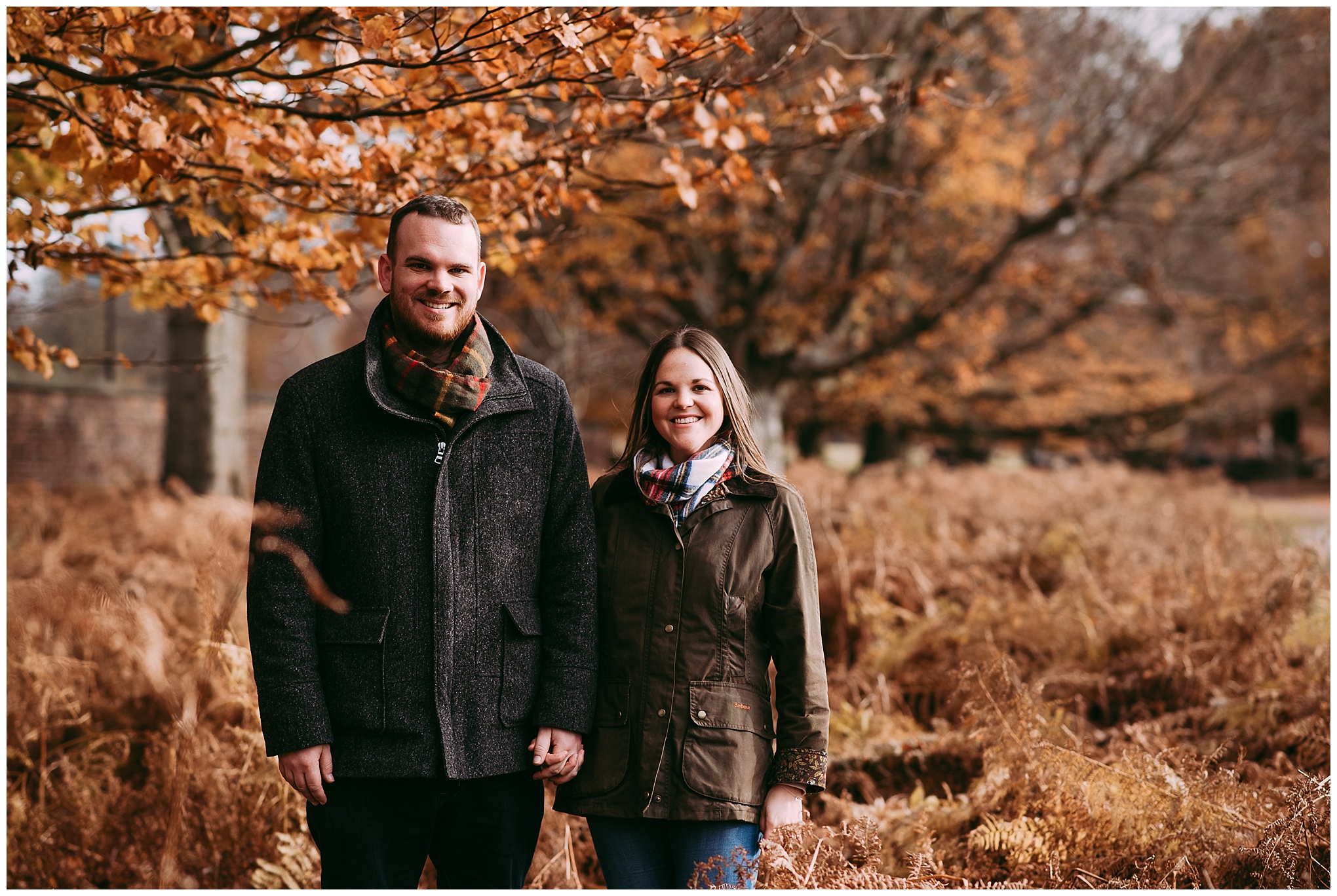 North west Engagement shoot. Couple walking in woods holding hands