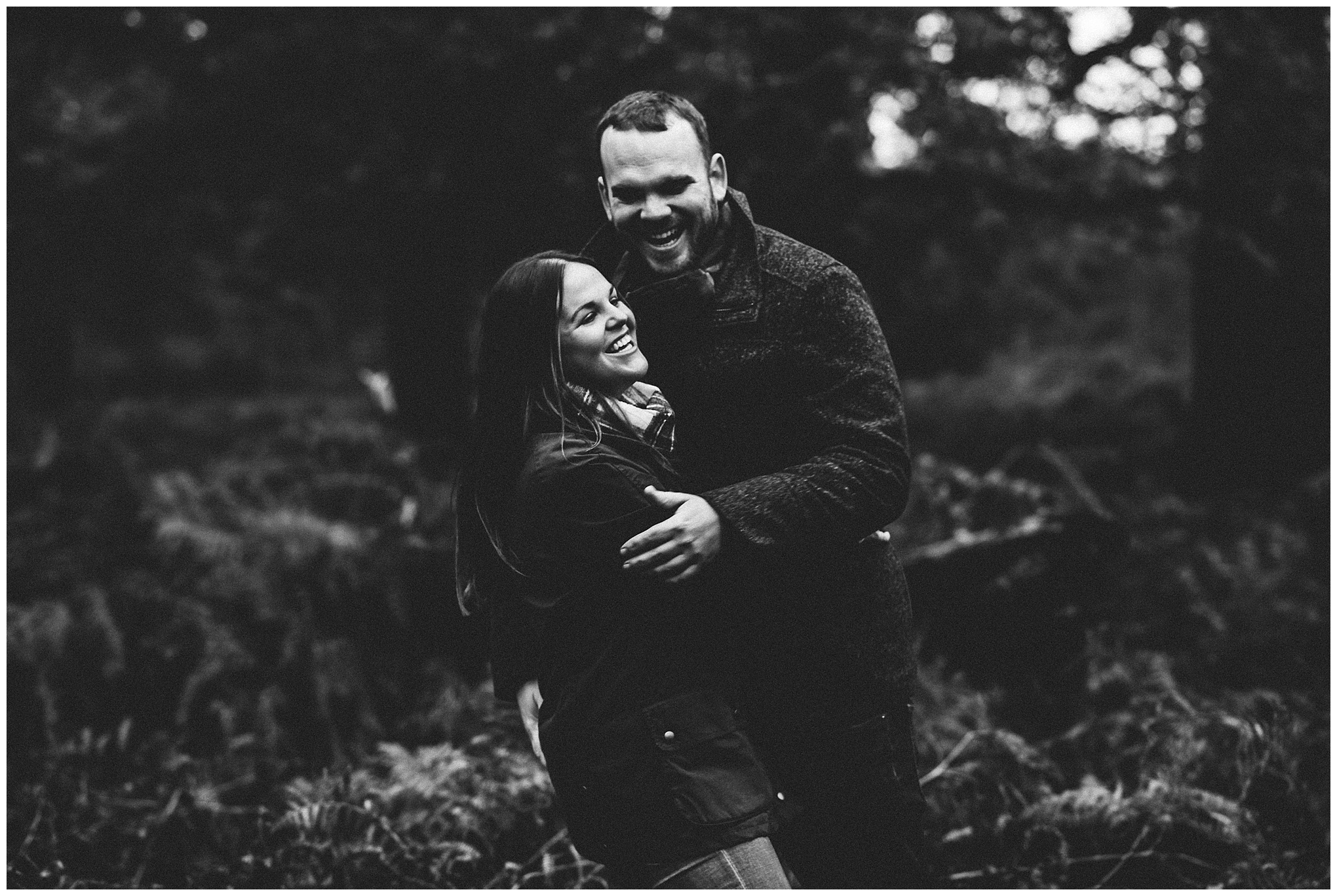 black and white photo of couple laughing together. Cheshire lifestyle photographer