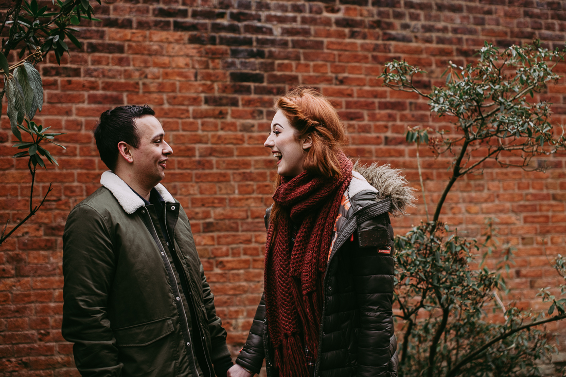 Couple laughing together. Natural lifestyle photography