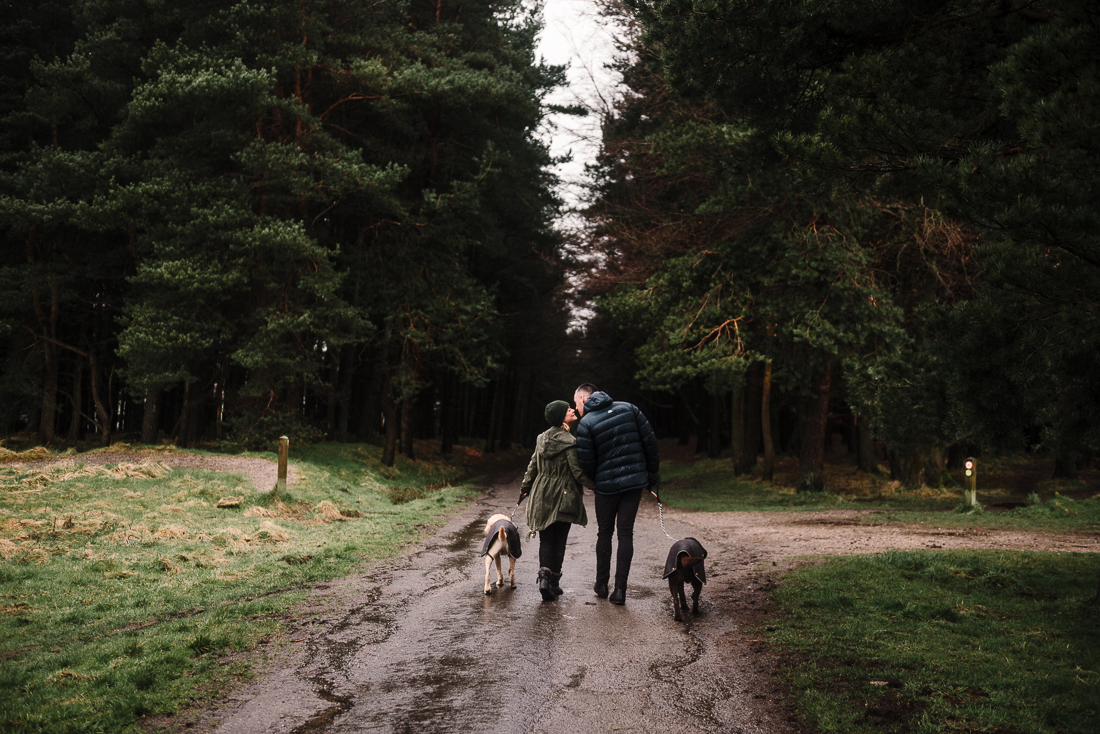 Couple and their dogs walking in Hurstwood, Burnley, Lancashire.