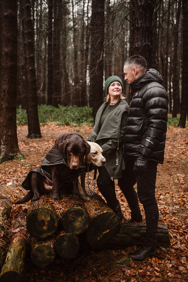 Portrait in the woods with couple and their dogs at Hurstwood, Burnley, Lancashire.