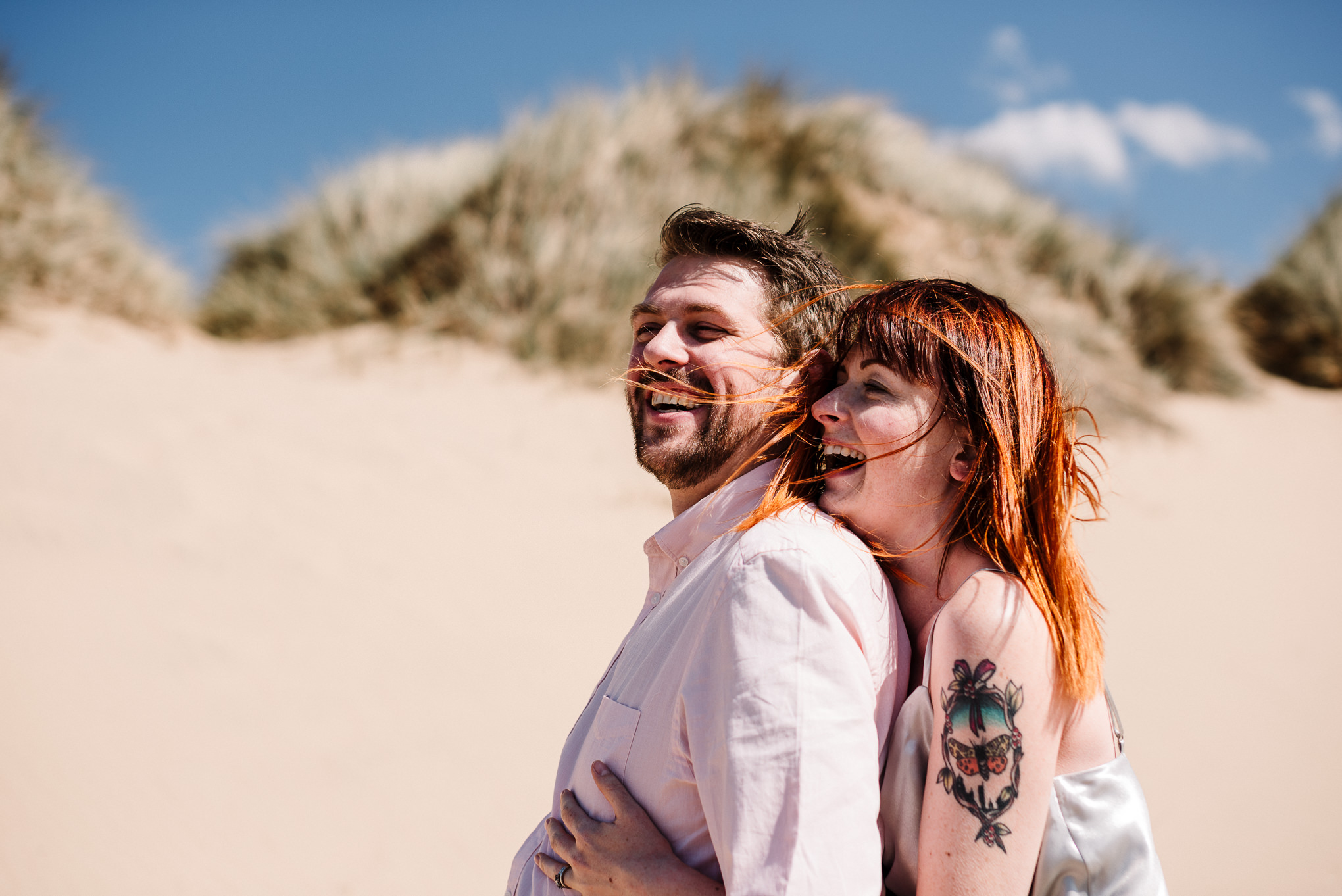 Natural shot of couple laughing. Liverpool wedding photography