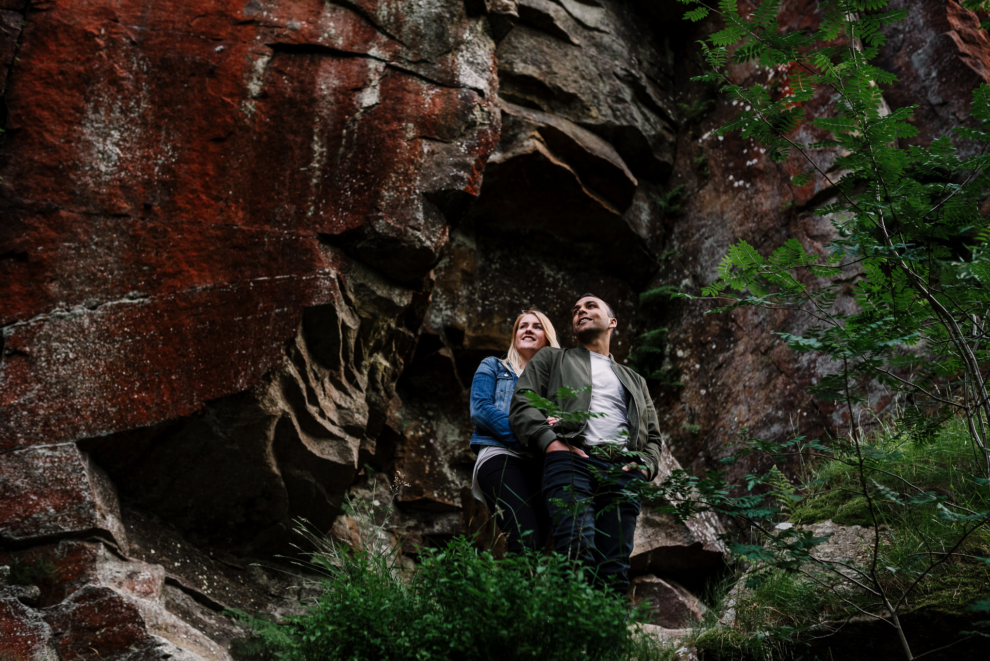 Infront of cliff face at Entwistle Reservoir. Lancashire lifestyle photographer