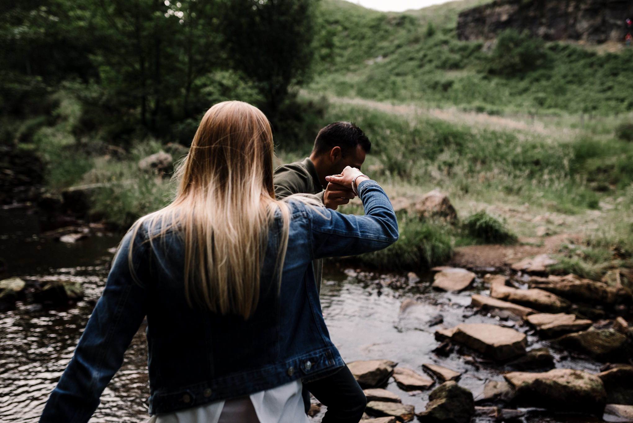 crossing the river at Entwistle Reservoir. Lancashire lifestyle photographer   