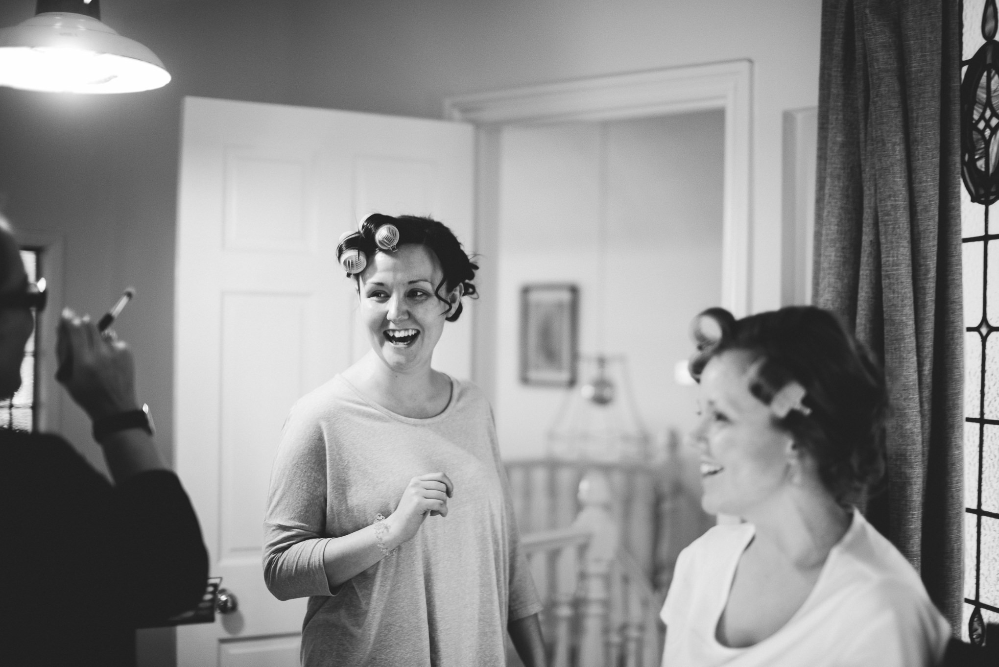 Natural shot of getting ready. Cornwall wedding photography.