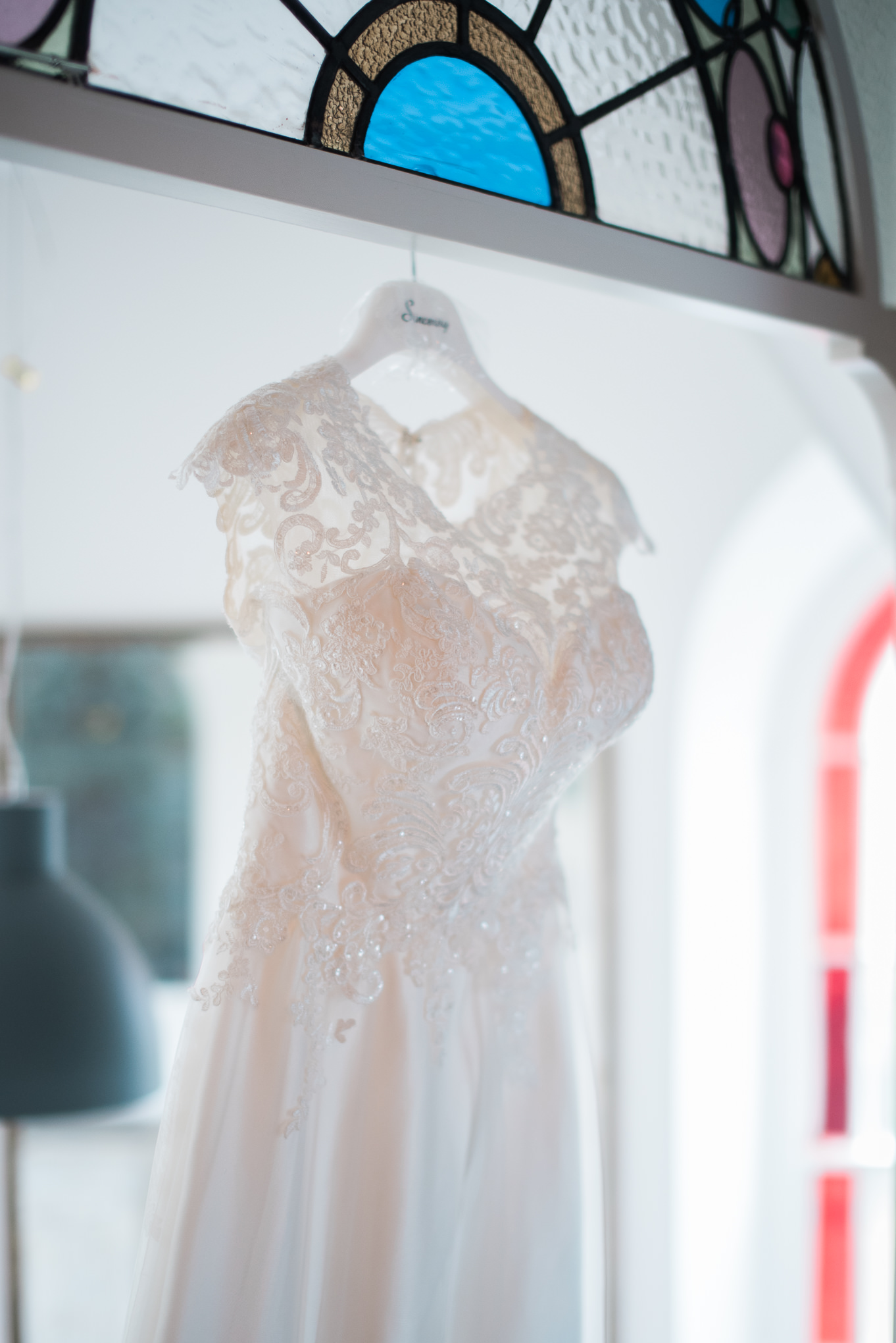 Detailed shot of lace on wedding dress