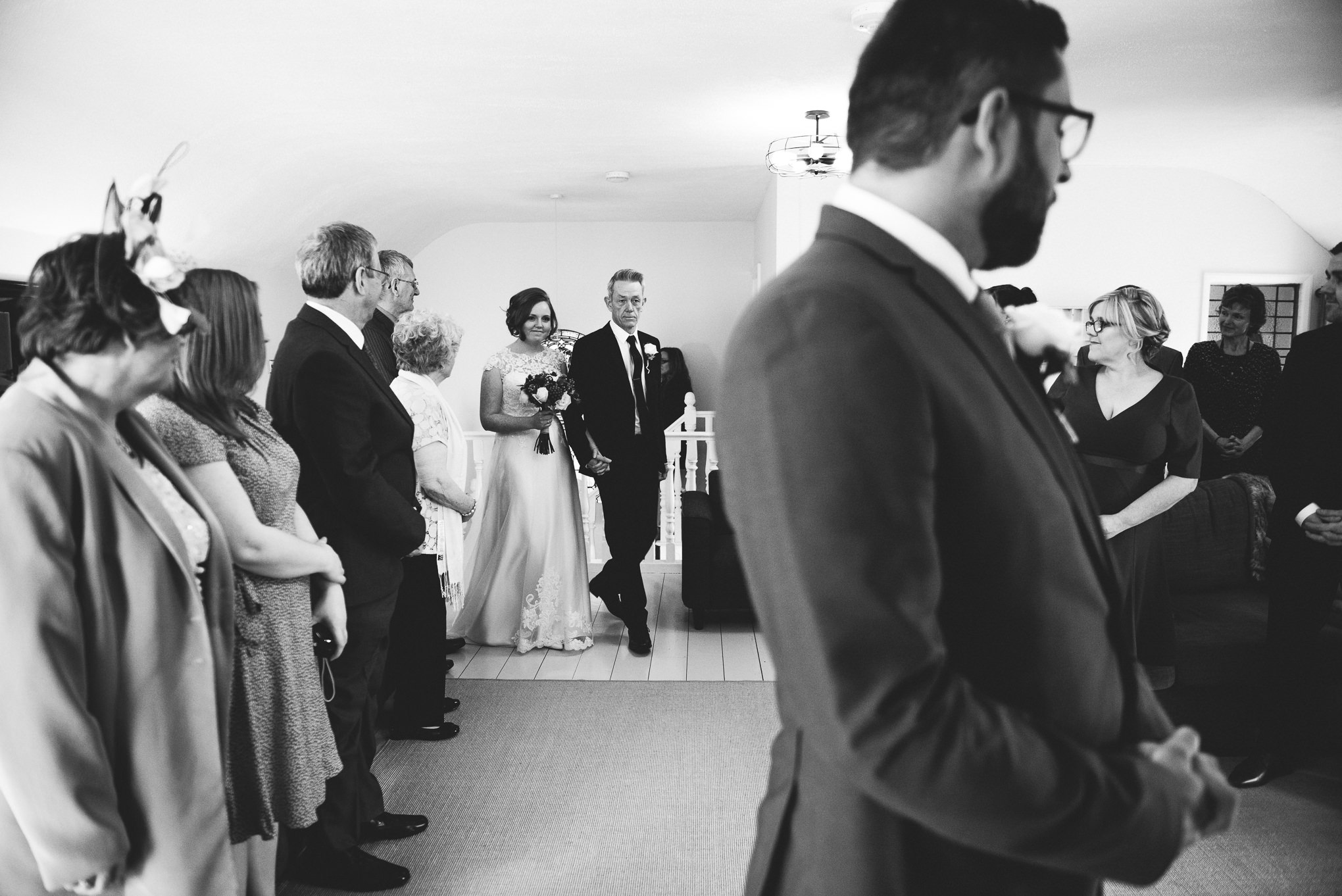 Bride entering the wedding ceremony at the Dreamcatcher. Cornwall wedding photography. 