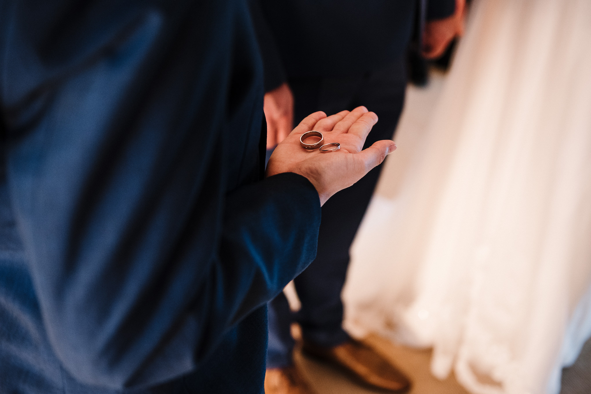 Close up shot of wedding rings. Elopement wedding photography, Cornwall. 