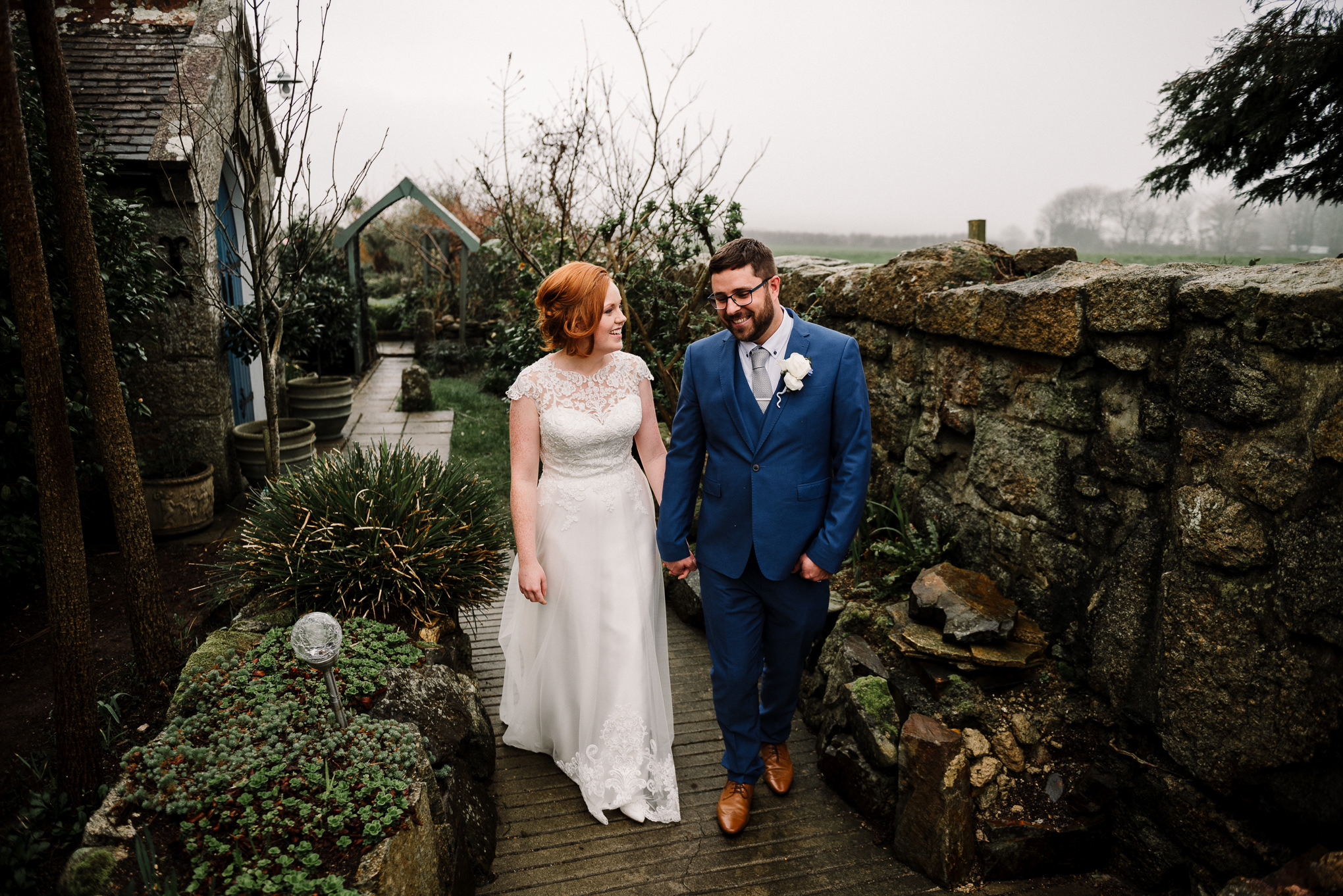 Natural shot of Bride and Groom walking 