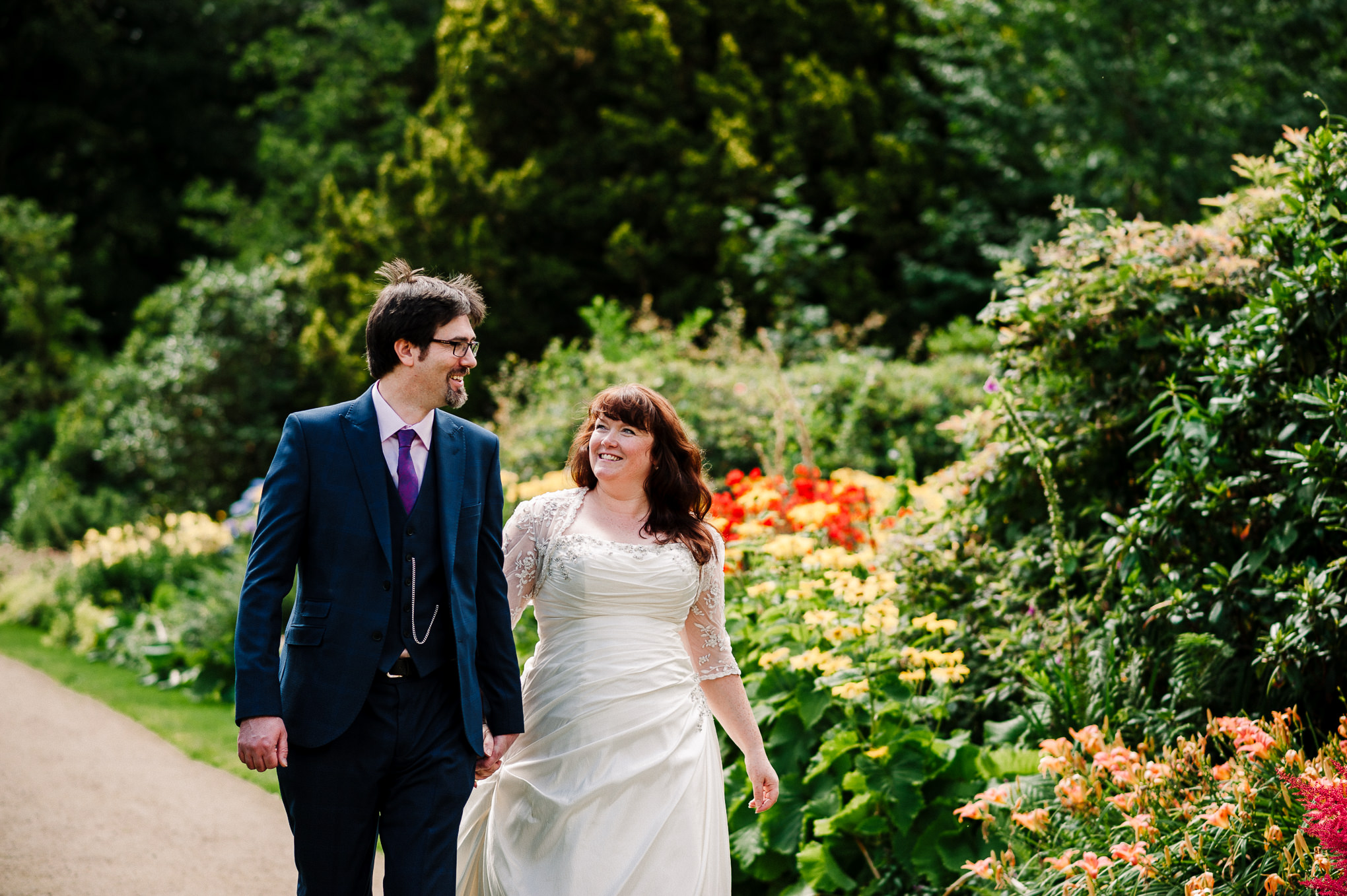 Modern wedding photography. Couple walking together.