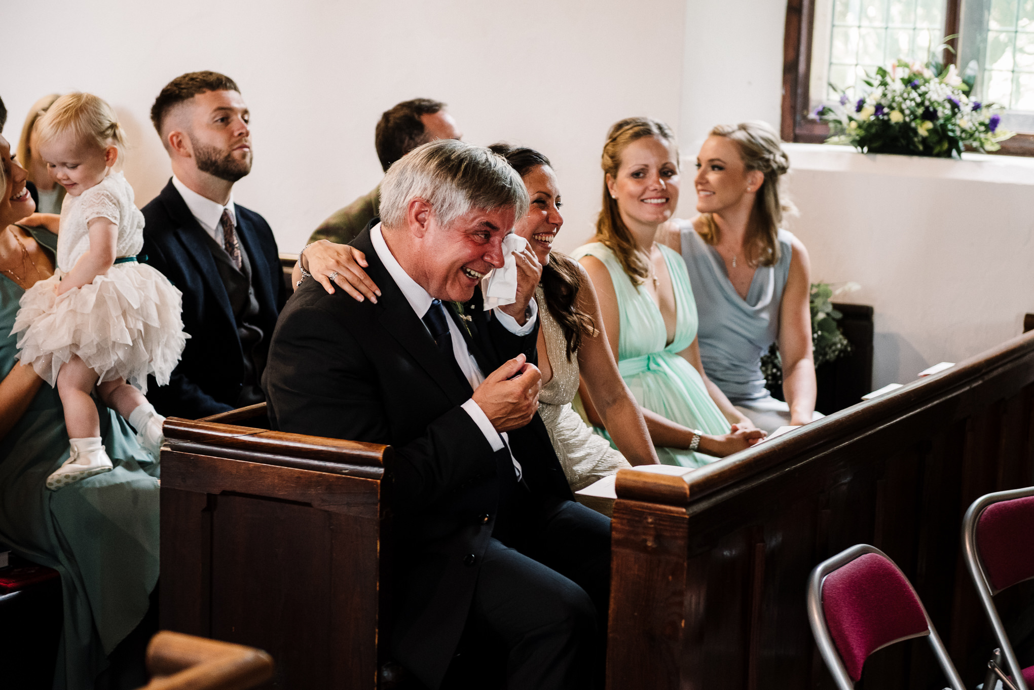 Father of the bride crying during ceremony. Lake district wedding photography.