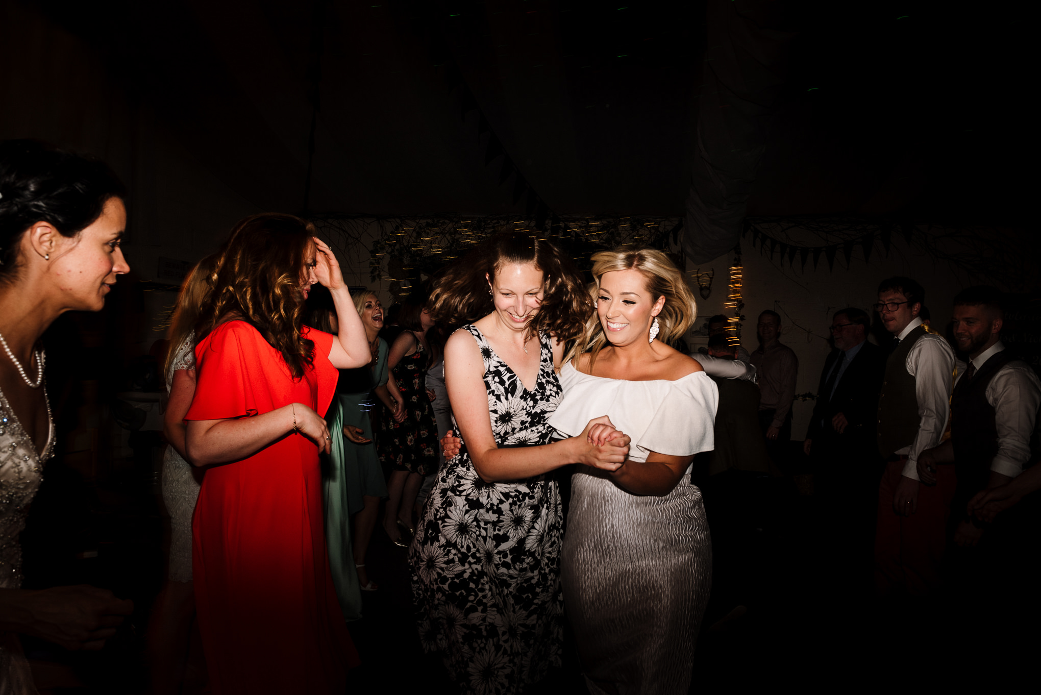 Ceilidh dancing. Natural wedding photography