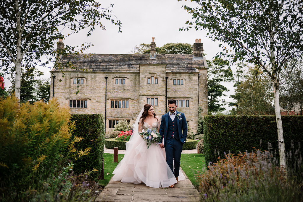 relaxed portrait of bride and groom at Stanley  house hotel. Ribble Valley wedding photography
