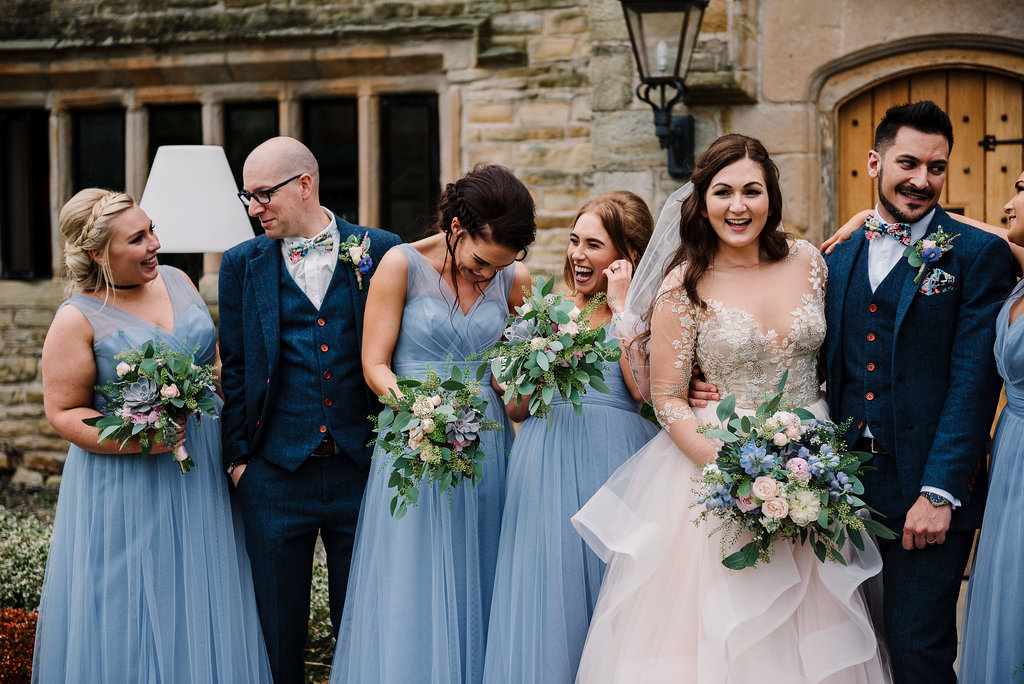 relaxed photo of bridal party chatting. 