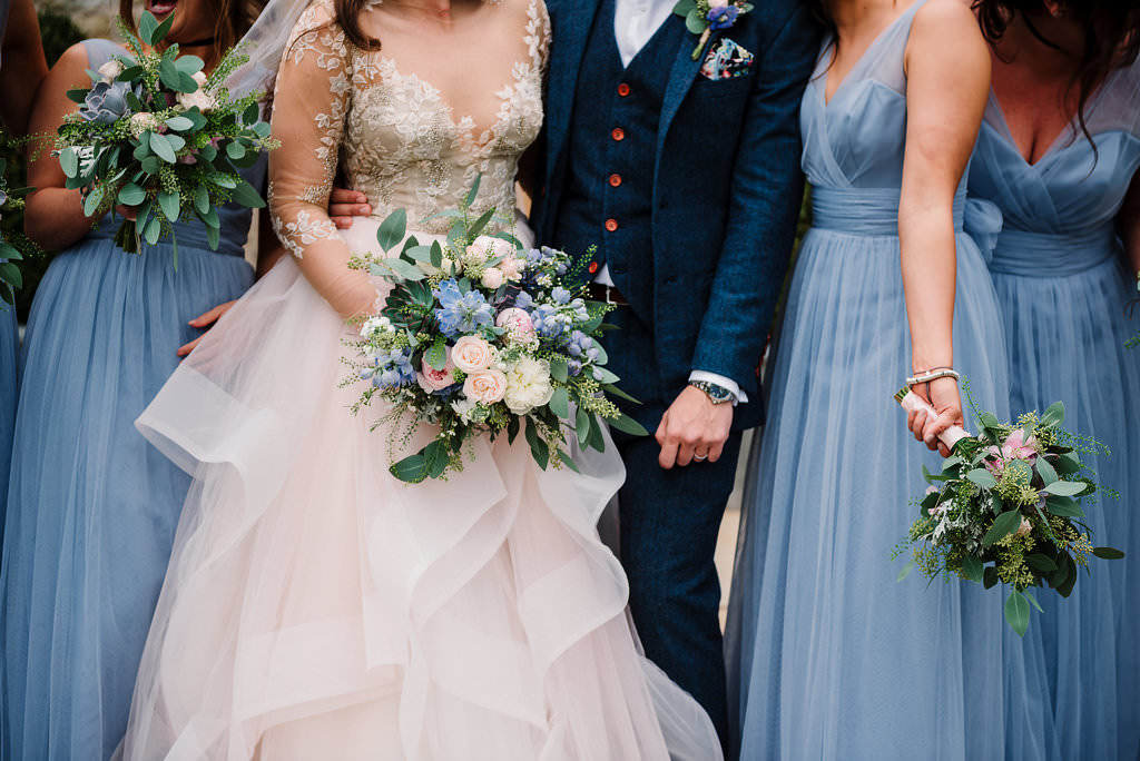 Detailed shot of brides and bridesmaid dresses.