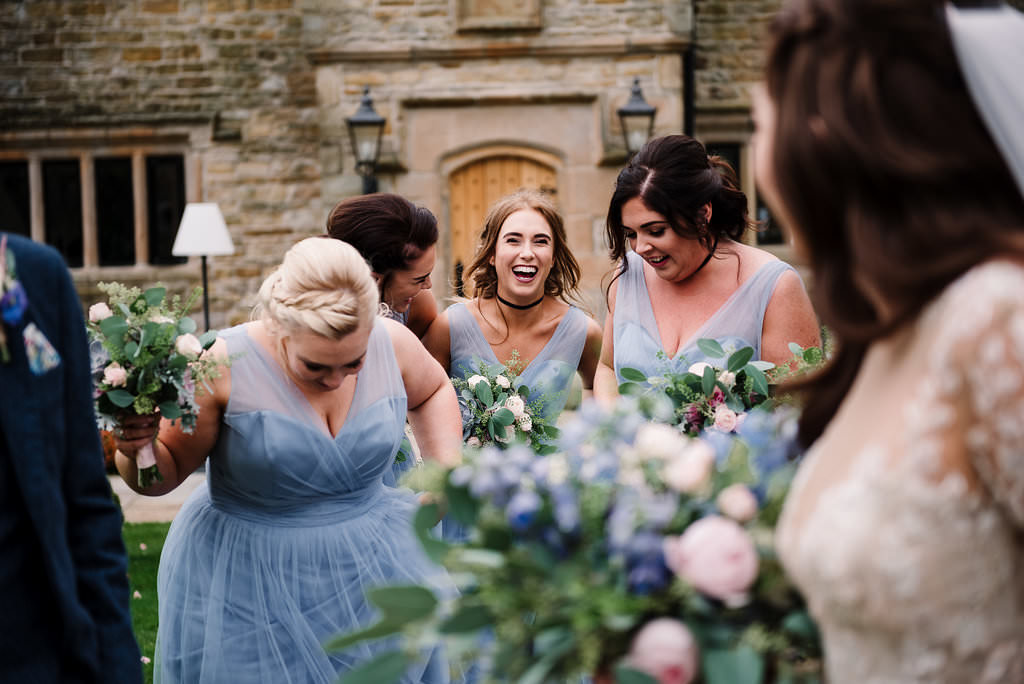 Colourful photo of bridesmaids outside at Stanley house hotel