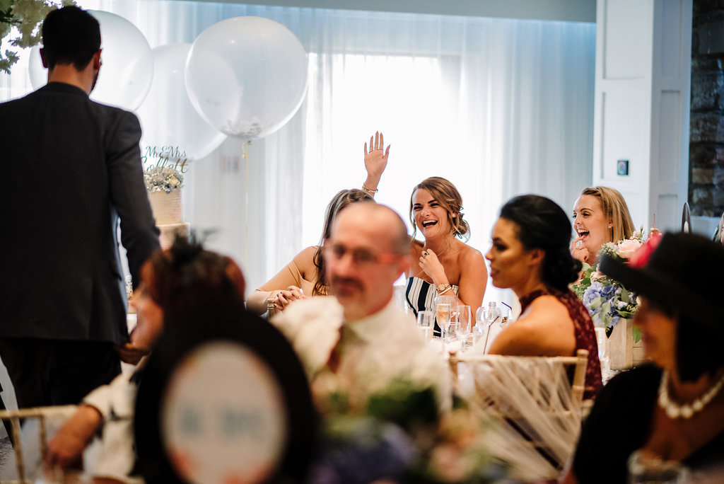 Relaxed photo of guests during speeches.
