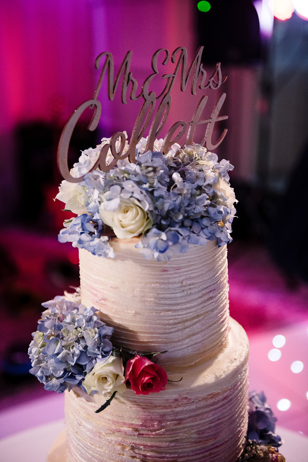 Colourful photo of the wedding cake.