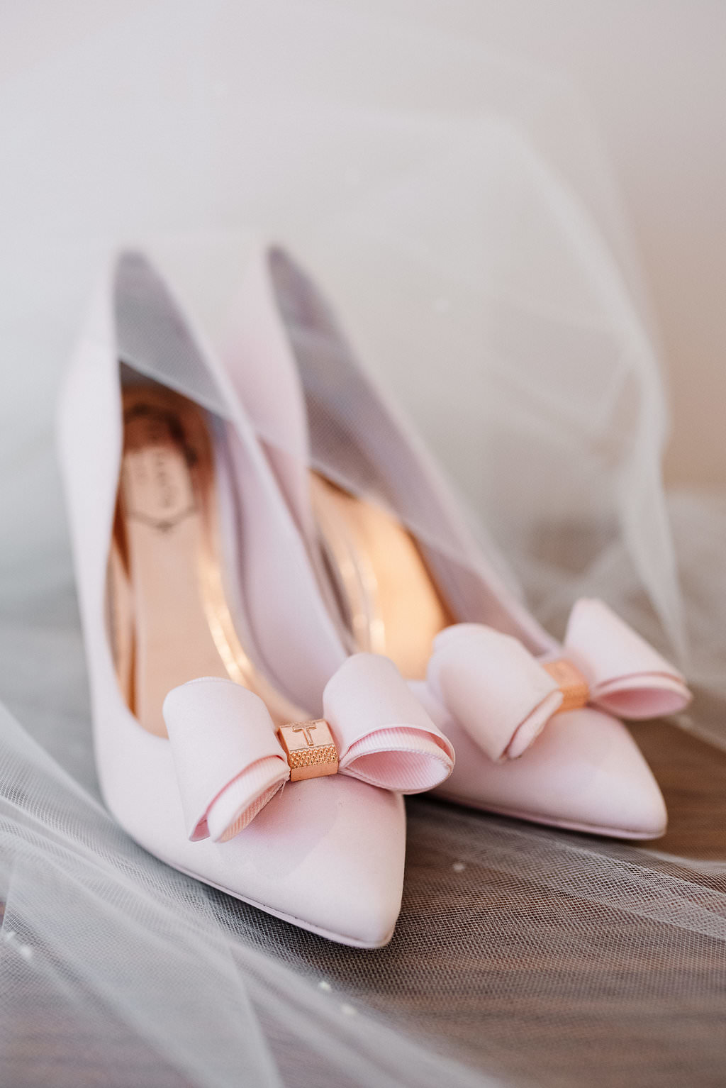 Brides baby pink Ted Baker shoes. Lancashire wedding photography