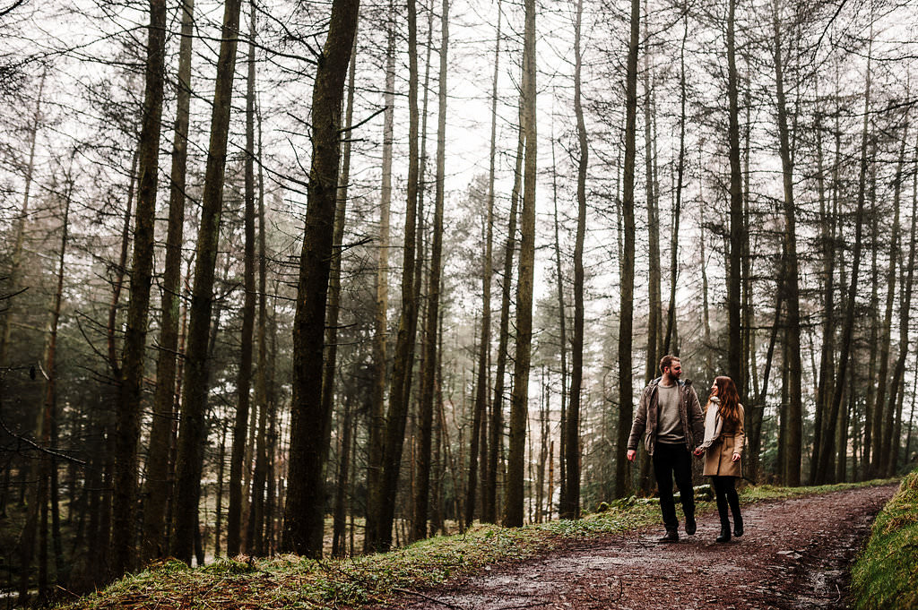 Couple walking in woods together. Bolton lifestyle photography
