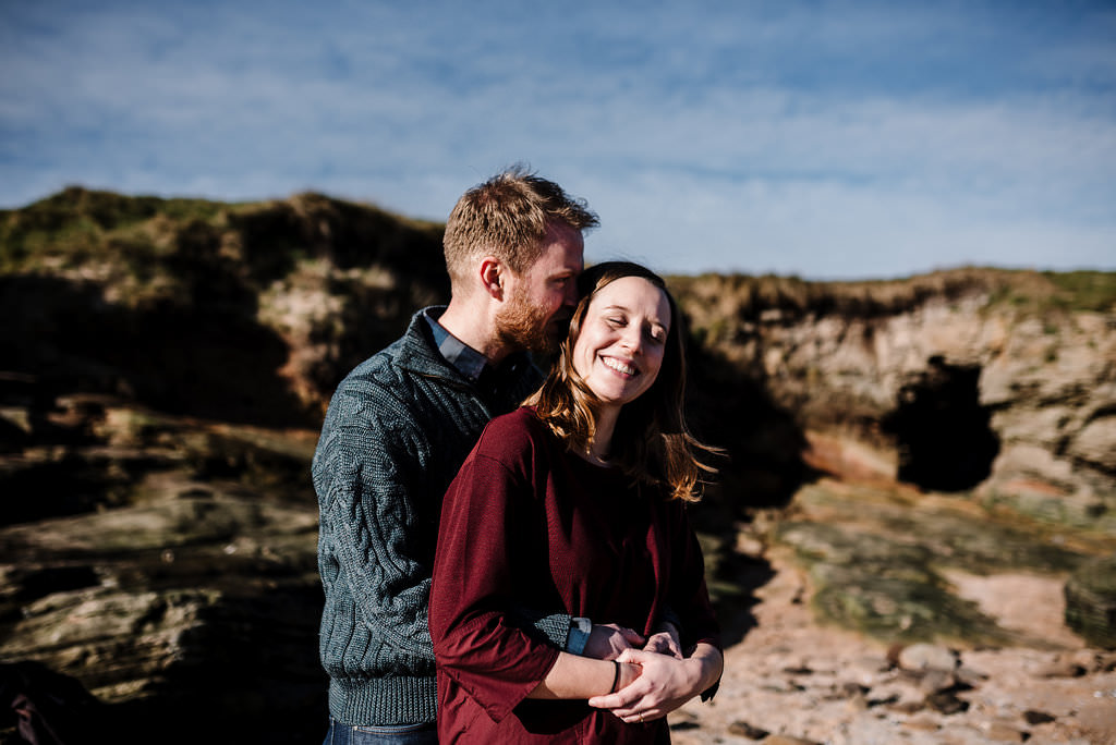 Natural, relaxed portrait whist hugging. West Kirby engagement photography