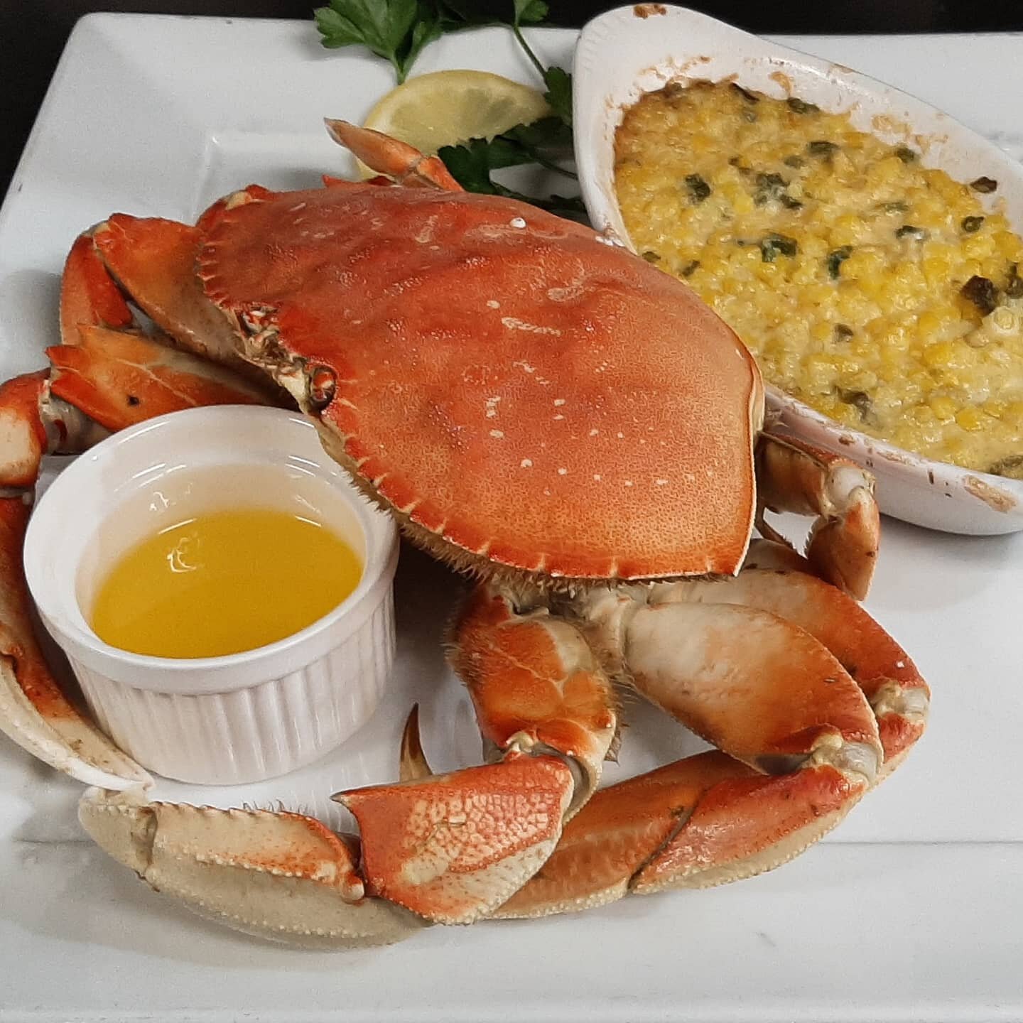 Whole Dungeness Crab dinner w/ herbed butter, corn pudding + baguette on the specials board this weekend! #fishpeopleseafood #eatlocal #supportlocal #teamschooner