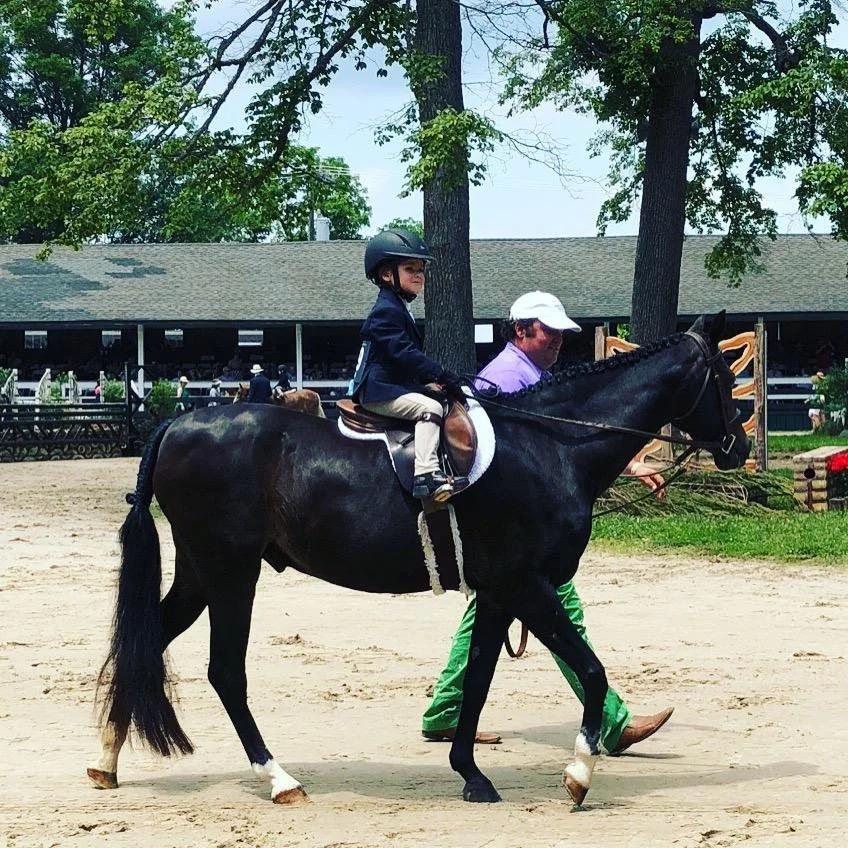 Lakeview NickNack and Olivia McCoy competing in Leadline at Upperville ages 1-3