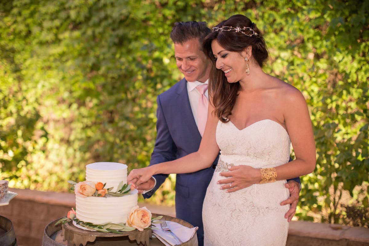www.santabarbarawedding.com | Anna J Photography | Alegria by Design | Firestone Vineyard | Cutting the Cake