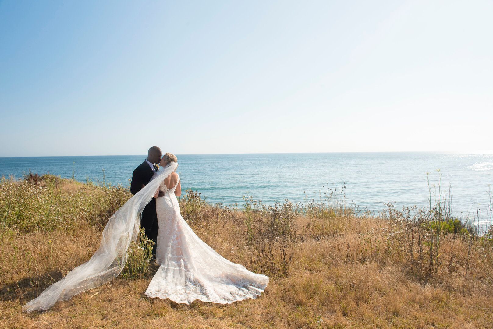 www.santabarbarawedding.com | Venue: Dos Pueblos Ranch | Photographer: ByCherry Photography | Event Designer: Elan Event Rentals | Bride and Groom Kiss