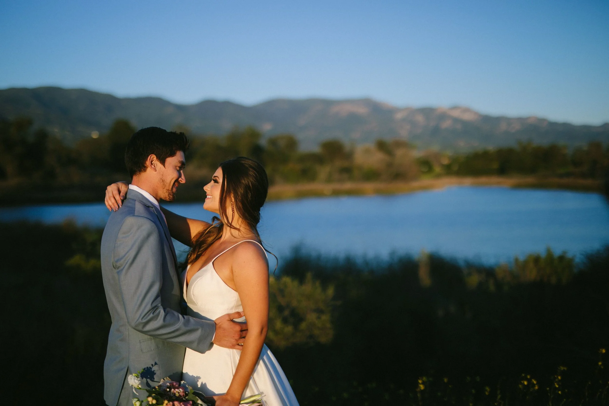 www.santabarbarawedding.com | Photographer: Patrick Ang | Venue: Rancho La Patera & Stow House | Wedding Planner: Elyse Rowen of Elyse Events | Bride and Groom Overlooking Water