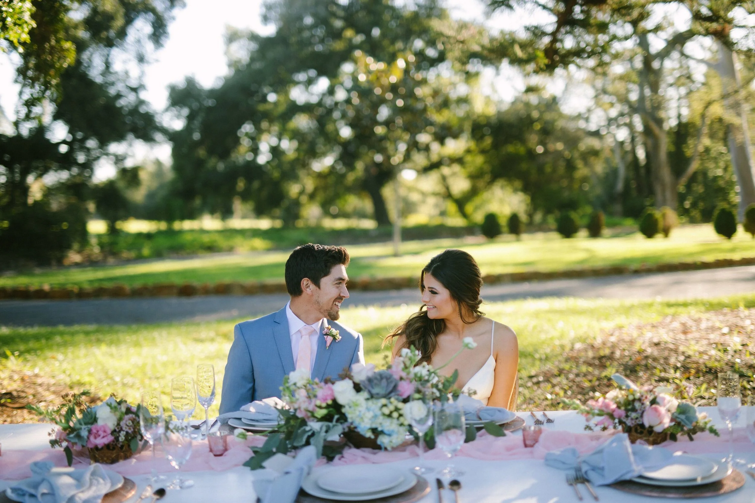 www.santabarbarawedding.com | Photographer: Patrick Ang | Venue: Rancho La Patera & Stow House | Wedding Planner: Elyse Rowen of Elyse Events | Bride and Groom at Table