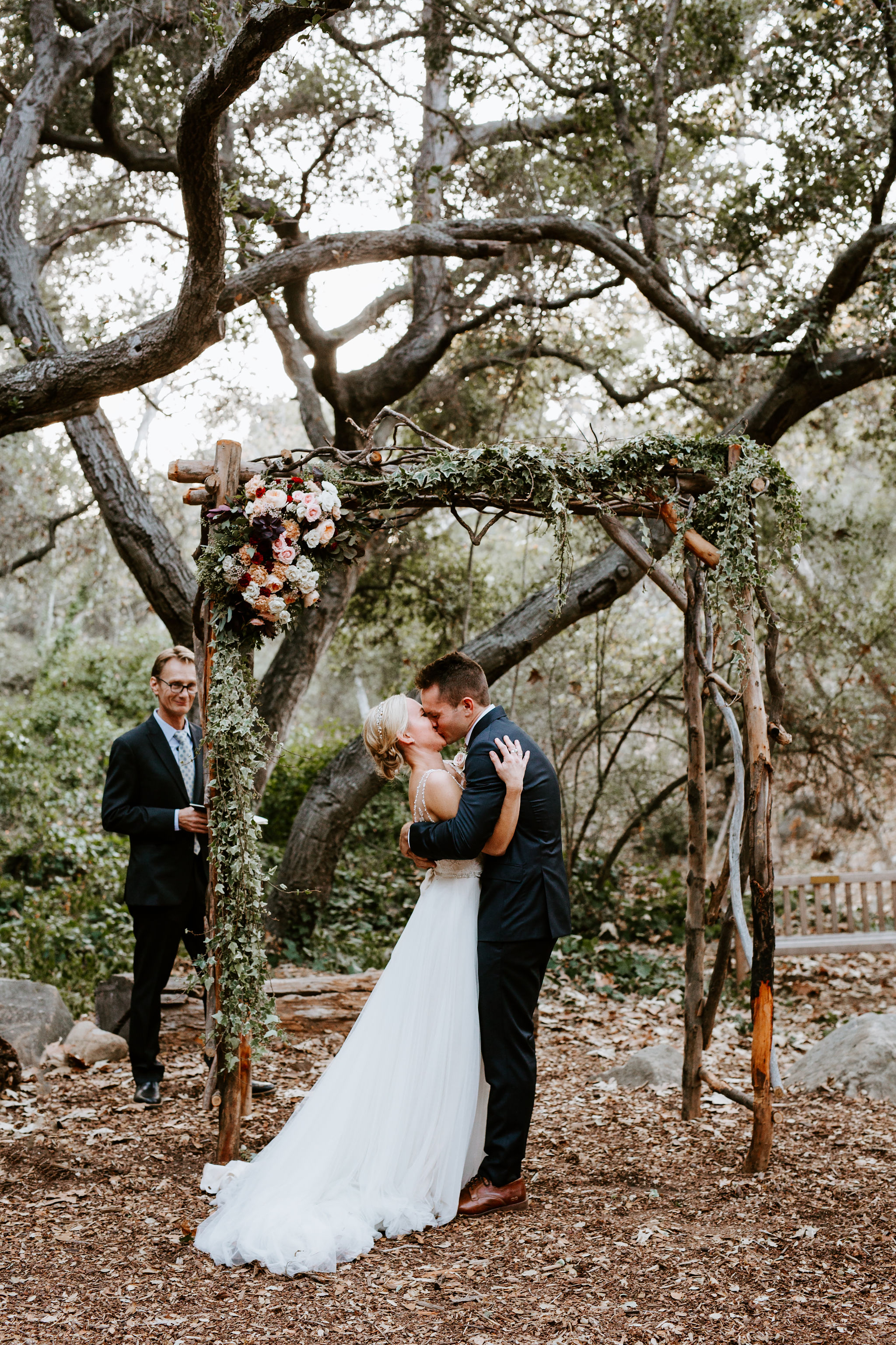 www.santabarbarawedding.com | Geoff and Lyndsi Photography | Santa Barbara Museum of Natural History | Jamie Mangone of LuJane Events | Topa Flora | Bride and Groom First Kiss