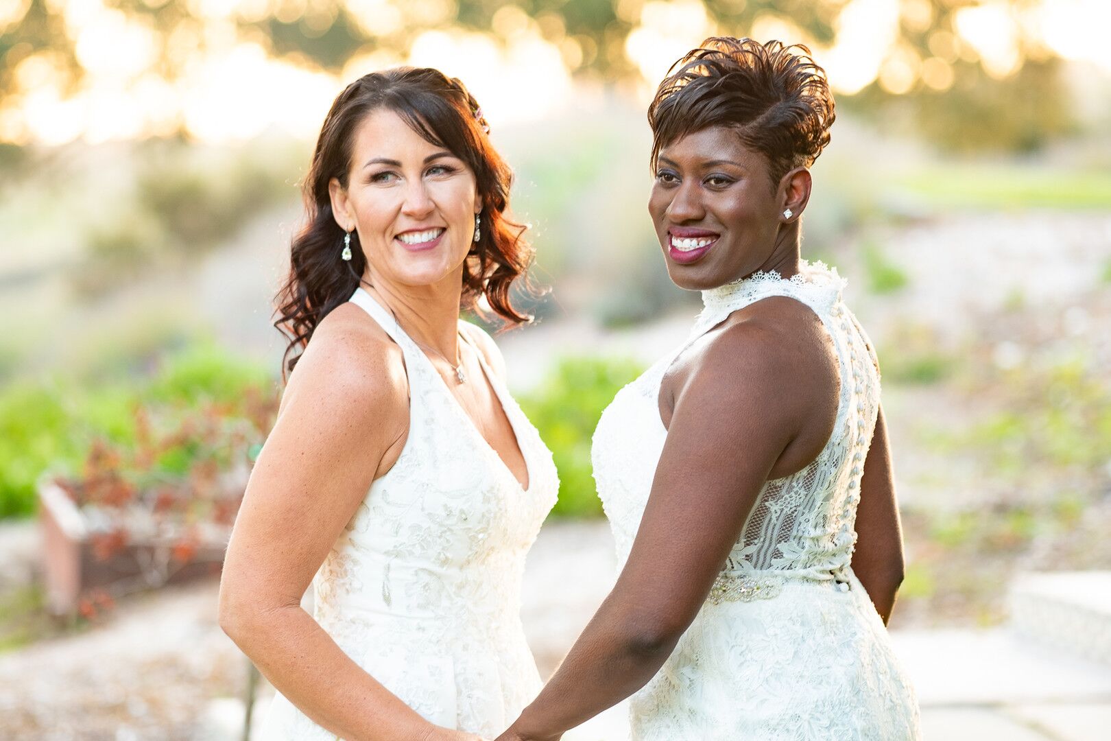 www.santabarbarawedding.com | Venue: The Casitas of Arroyo Grande | Photographer: Renoda Campbell Photography | Second Shooter: John Patrick Images | Brides Holding Hands
