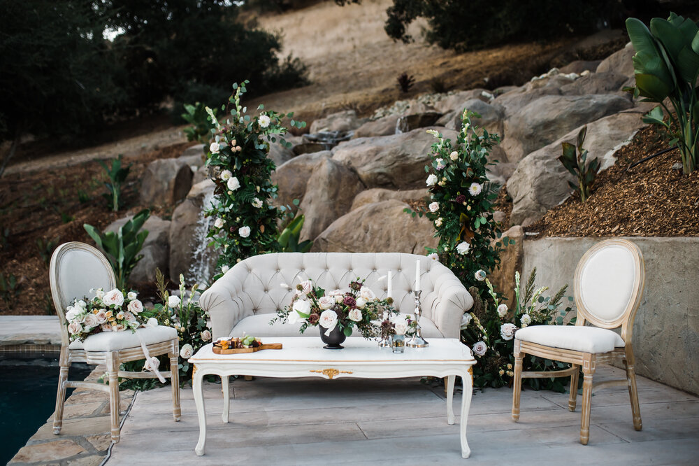 www.santabarbarawedding.com | The Tavern at Zaca Creek | Events by Fran | Michelle Ramirez Photography | Tangled Lotus | Amigo Party Rentals | Lounge Area with Flowers