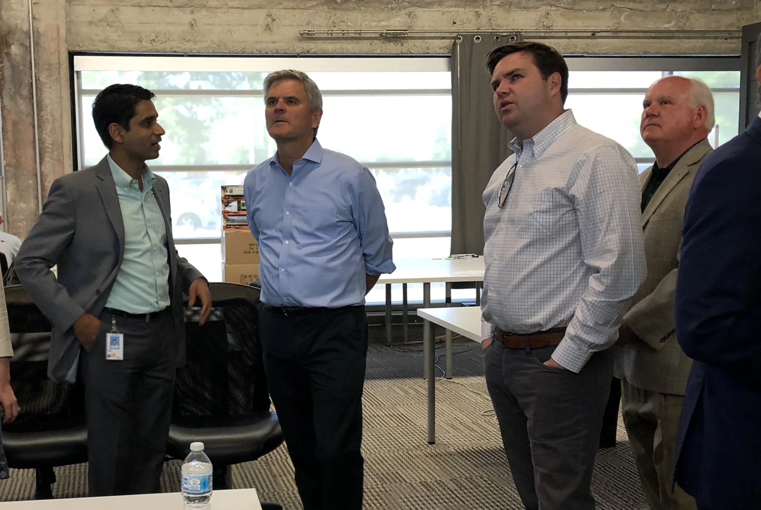 Dr. Sameer Ather, CEO of Birmingham company XpertDox, meets with, from left to right, Steve Case, J.D. Vance and Dr. Ray Watts during the Rise of the Rest visit in May. Case said Birmingham "exceeded our expectations."