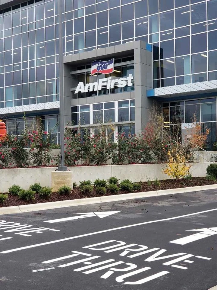 America’s First Federal Credit Union’s expanded headquarters includes a retail branch on the first floor of the new building.