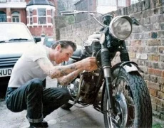 Mechanic Working On Cruiser