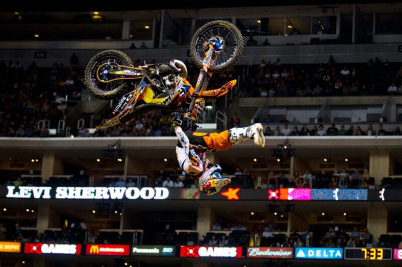 Watch Motocross Pro Travis Pastrana Breaks Down Motocross Stunts