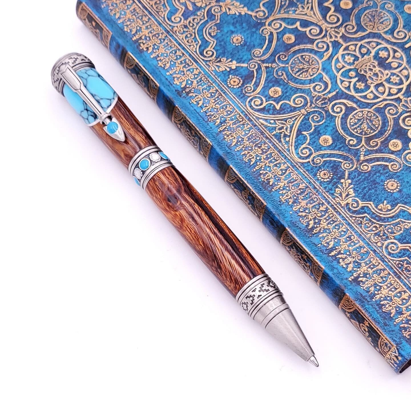 Gorgeous pen &quot;hot off the press&quot; and shipping to a customer today!
.
.
.
#woodnotchgifts #woodnotch #ironwood #handcrafted #handmade #luxurygifts #luxurypens #uniquegifts #penlove #turquoisepen #turquoisejewelry #desertironwood #tucsonarizo