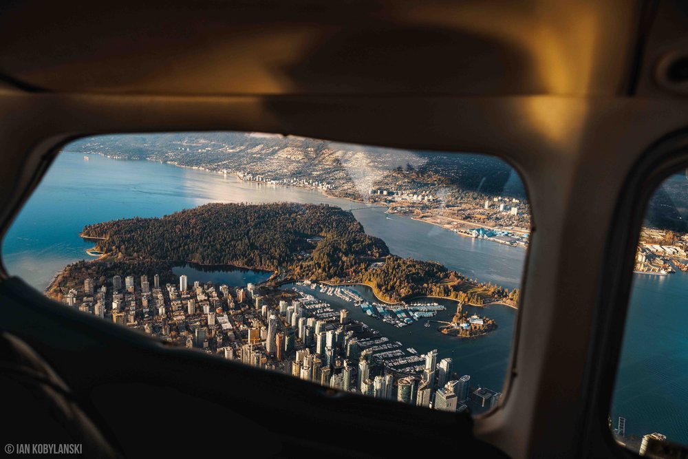  View of Vancouver’s Stanley Park and Coal Harbour from the airplane window. 