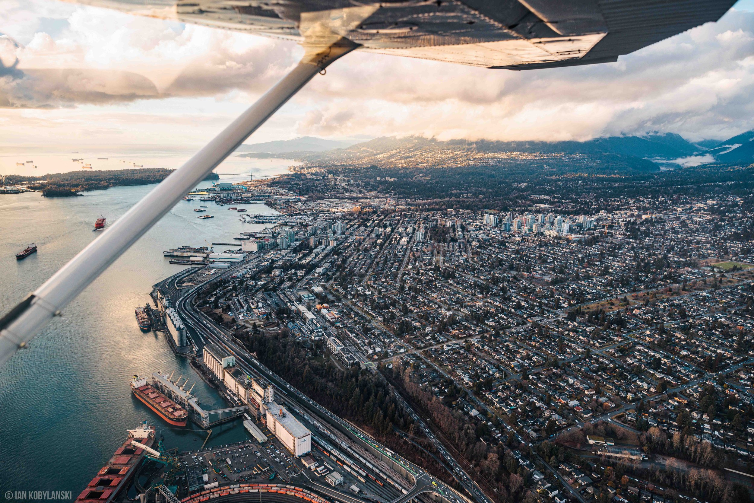  The ports of North Vancouver and the North Shore, with the Lions Gate Bridge and West Vancouver off in the distance. 