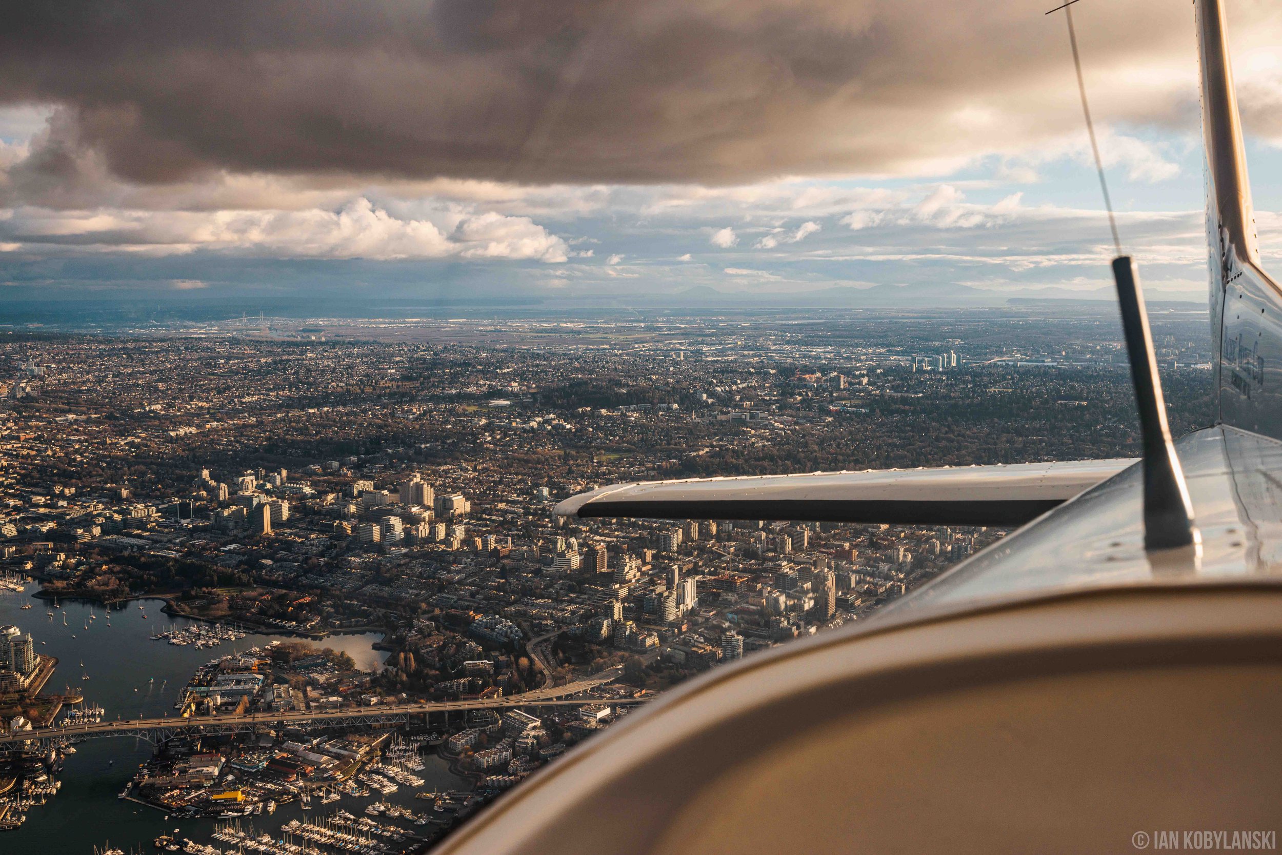  Vancouver’s Granville Island, False Creek, and Broadway-City Hall area from the rear window of a private airplane. 