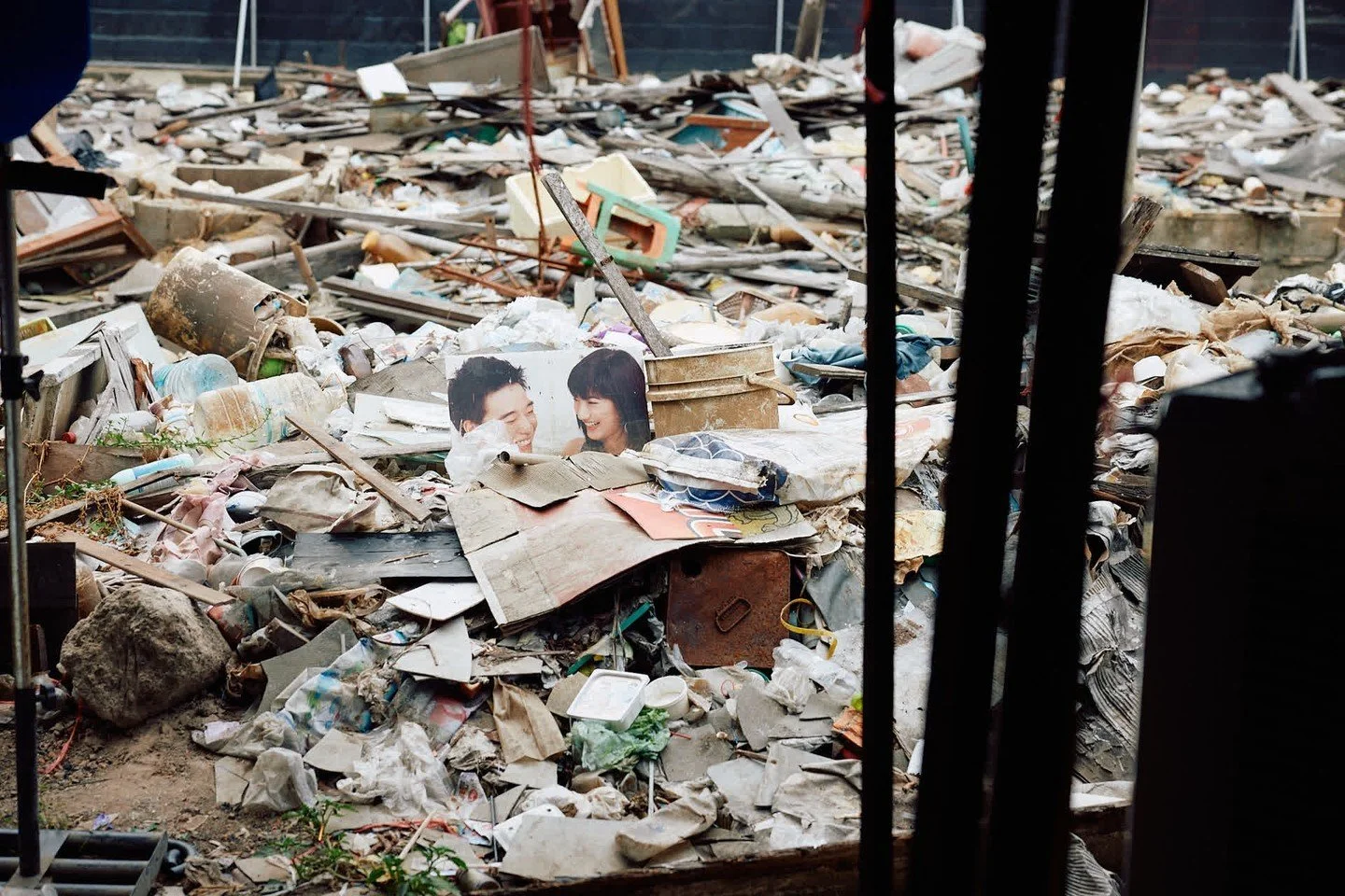 Paper (plastic) smiles

Faded smiles that seemed out of place behind a floating market in Bangkok.

10,000 tonnes of trash is collected every day in Bangkok. Plastic waste being reused, living beyond its typical lifespan, and made into art gives this