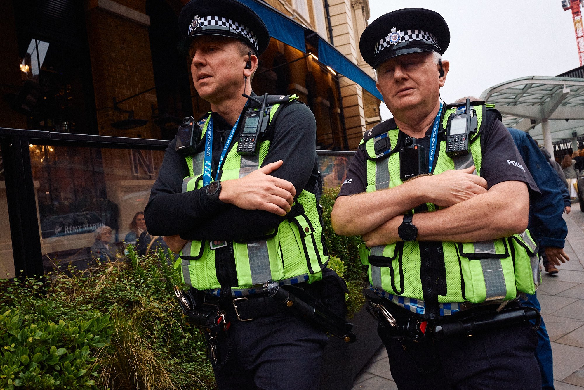 Steet Photography London | Crossed Bobby Pair