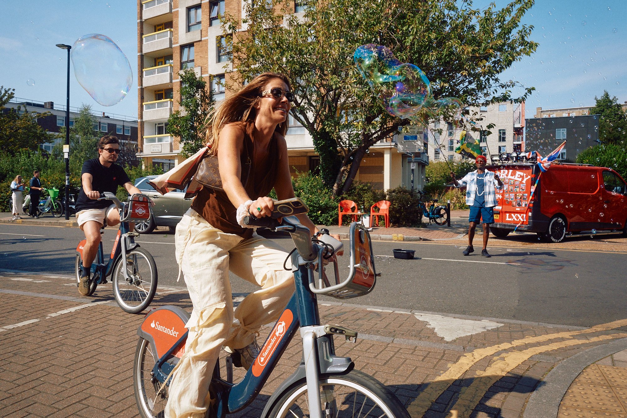 Steet Photography London | Santander Cycle through Bubbles