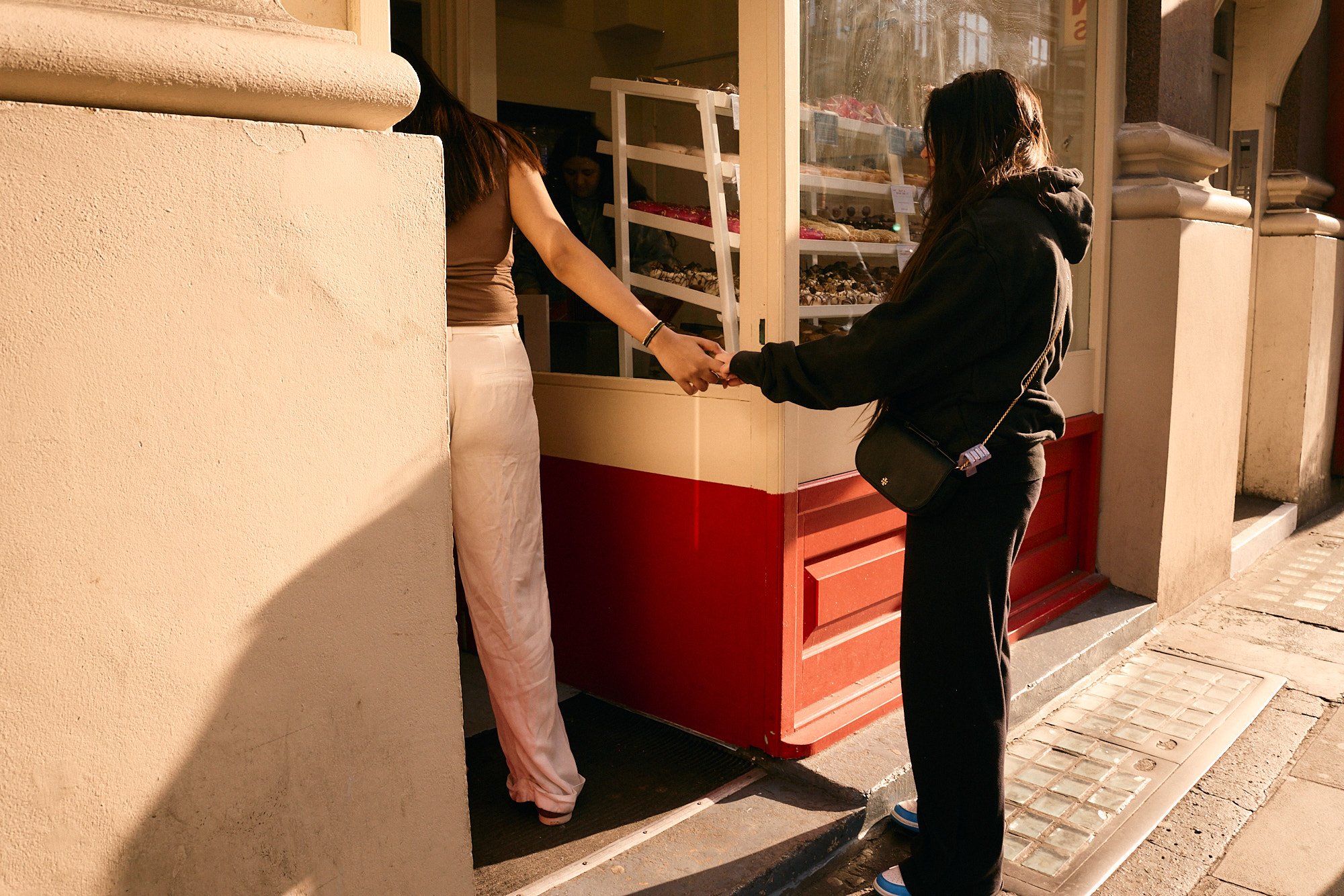 Steet Photography London | Sweet Treat Hand Hold
