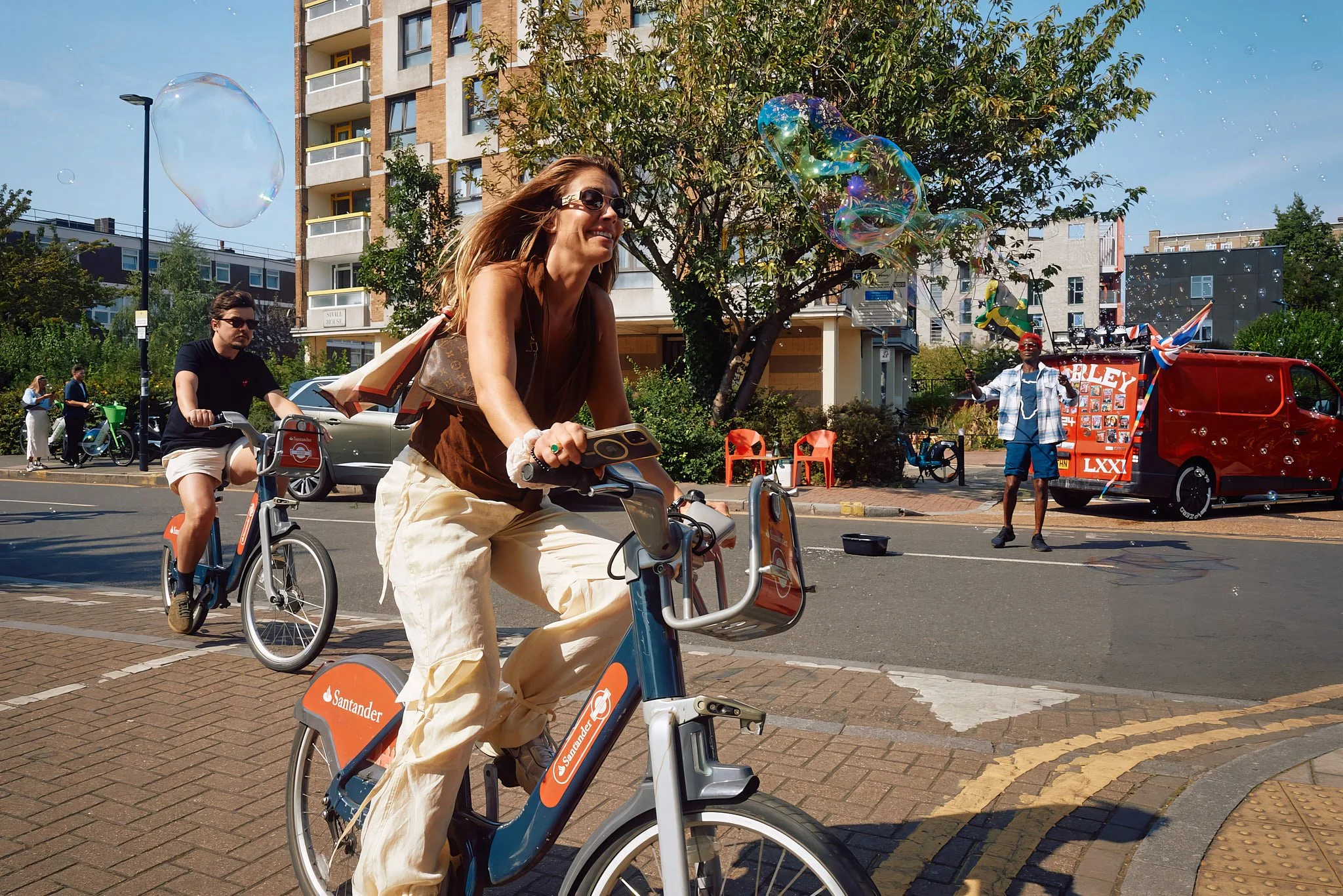 Steet Photography London | Cycle Through Bubbles