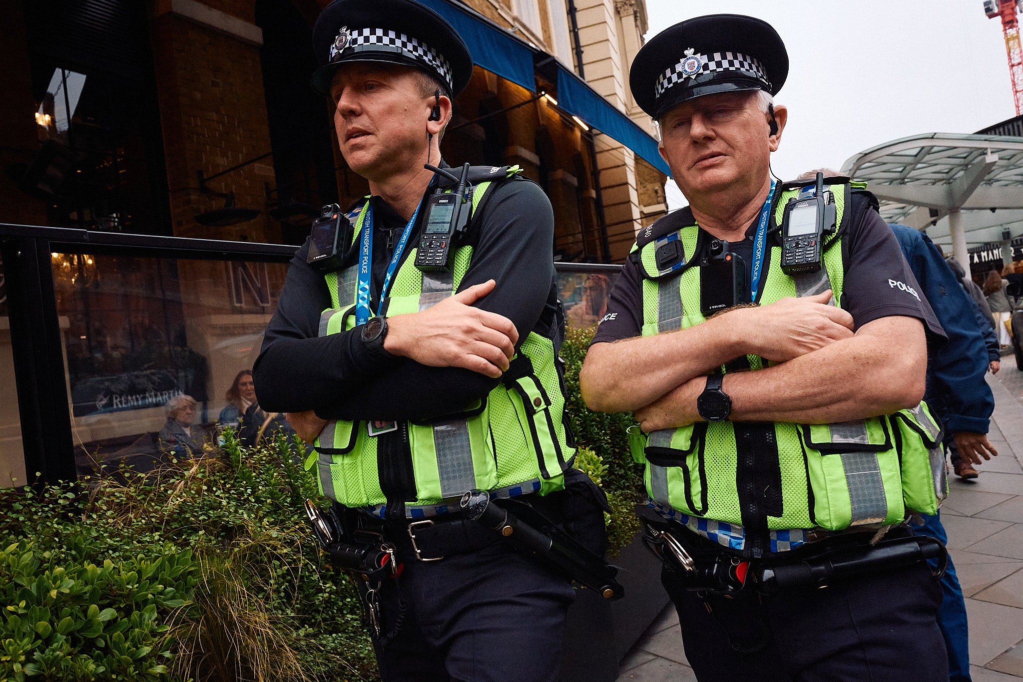 Steet Photographer London | Crossed Bobby Pair